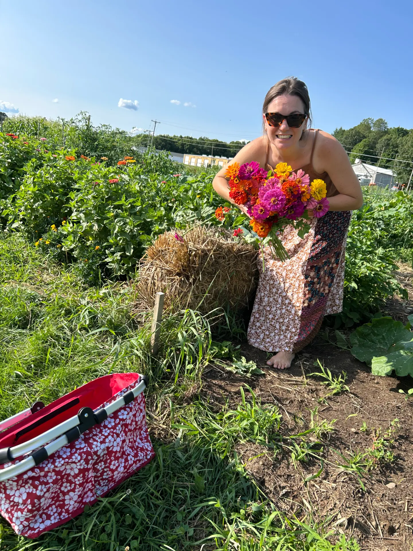 Alli holding a bouquet of flowers in the garden