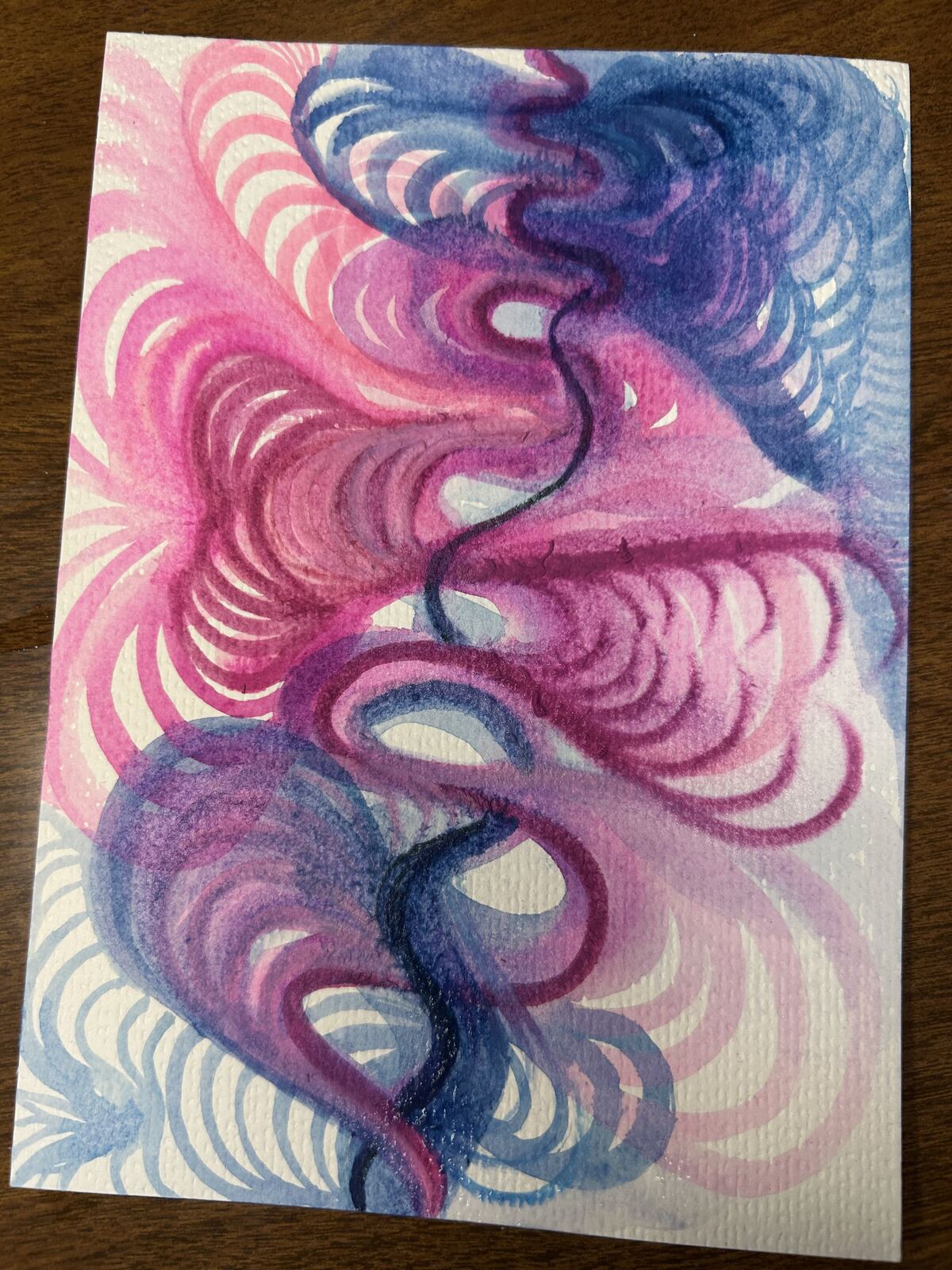 Pink, purple, and blue watercolor piece with a dark thread winding through layered spiral forms shows a glitch in the timeline where it loops you back while some proceed